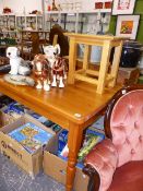 A SMALL PINE KITCHEN TABLE AND AN OCCASIONAL TABLE.