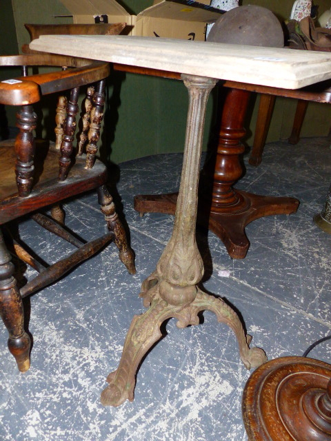 A TREADLE SEWING MACHINE CAST IRON TABLE.