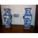 A PAIR OF BLUE AND WHITE VASES.