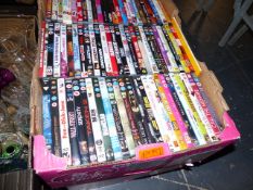 A LARGE QTY OF DVDS.