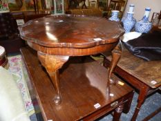 A MAHOGANY COFFEE TABLE.