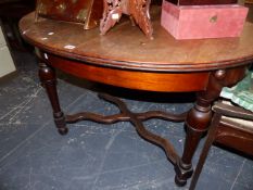 A MAHOGANY EXTENDING TABLE.