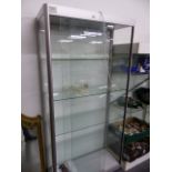 A GOOD QUALITY ALLOY FRAMED GLASS DISPLAY CABINET.