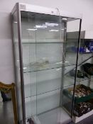 A GOOD QUALITY ALLOY FRAMED GLASS DISPLAY CABINET.