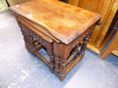 AN OAK NEST OF TABLES.