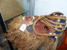 AN AFRICAN MASK.