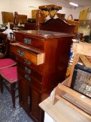 AN EDWARDIAN MAHOGANY MUSIC CABINET.