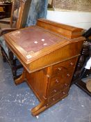 A LATE VICTORIAN DAVENPORT DESK.