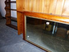 A VICTORIAN OVERMANTLE MIRROR AND A WALL SHELF.