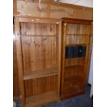 TWO PINE BOOKCASES.