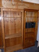 TWO PINE BOOKCASES.