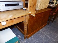 AN ANTIQUE PINE SIDE TABLE ,A LARGE OTTOMAN AND A WALL SHELF.