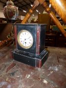 A VICTORIAN MANTLE CLOCK.