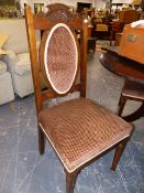 A SET OF FOUR EDWARDIAN SIDE CHAIRS.