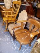 AN OAK SWIVEL OFFICE CHAIR, A ROCKING CHAIR AND AN ART DECO LOW CHAIR.