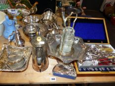 A QTY OF SILVER PLATED WARES.