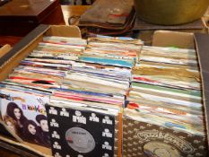 A COLLECTION OF 45rpm RECORD SINGLES.