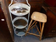 A THREE TIER MIRRORED STAND AND A STOOL.