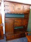 AN OAK FINISHED SIDE CABINET.