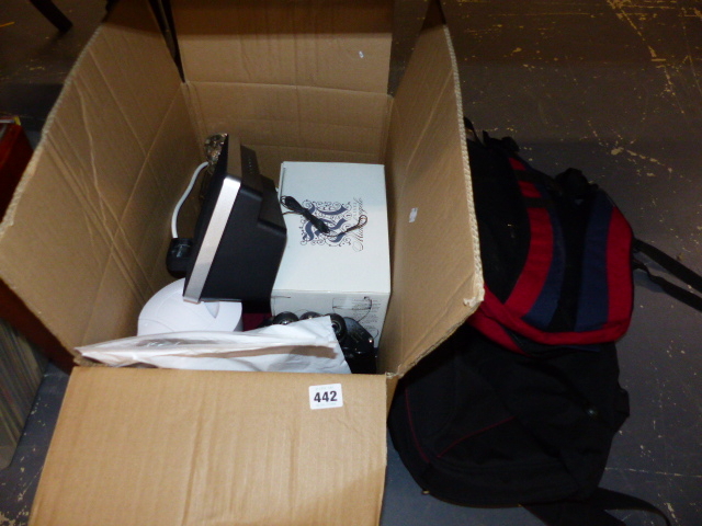 A BOX OF COLLECTABLES AND TWO BACK PACKS.