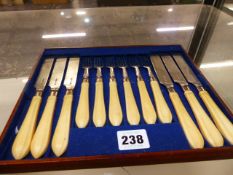 A SET OF HALLMARKED SILVER DESSERT CUTLERY.