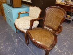 TWO FRENCH STYLE CARVED SHOW FRAME ARMCHAIRS.