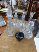 VARIOUS CUT GLASS DECANTERS.