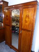 AN EDWARDIAN MAHOGANY INLAID TRIPLE WARDROBE.