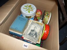 A QTY OF BOOKS AND TOYS AND A LARGE TIN TRUNK.