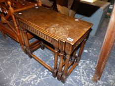 AN OAK NEST OF TABLES.