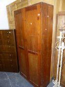 A PINE STORAGE CUPBOARD.