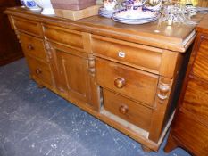 A VICTORIAN PINE DRESSER BASE.