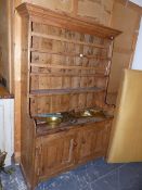 A VICTORIAN PINE KITCHEN DRESSER.