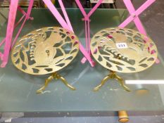 A PAIR OF BRASS TRIVETS.