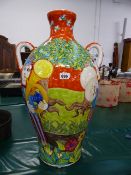 A LARGE ABSTRACT DECORATED VASE.