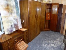 AN ART DECO WALNUT BEDROOM SUITE.