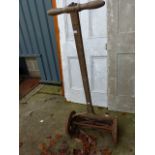 A VINTAGE TAYLOR FORBES PUSH MOWER.