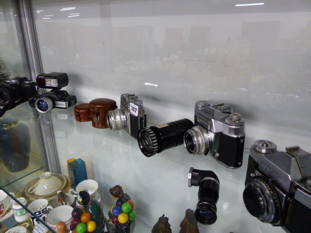 A GROUP OF CAMERAS TO INCLUDE VOIGTLANDER, ZEISS, MINOLTA 110 SLR, ETC.