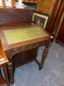 AN OAK DAVENPORT DESK.