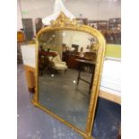 A LARGE VICTORIAN OVERMANTLE MIRROR.