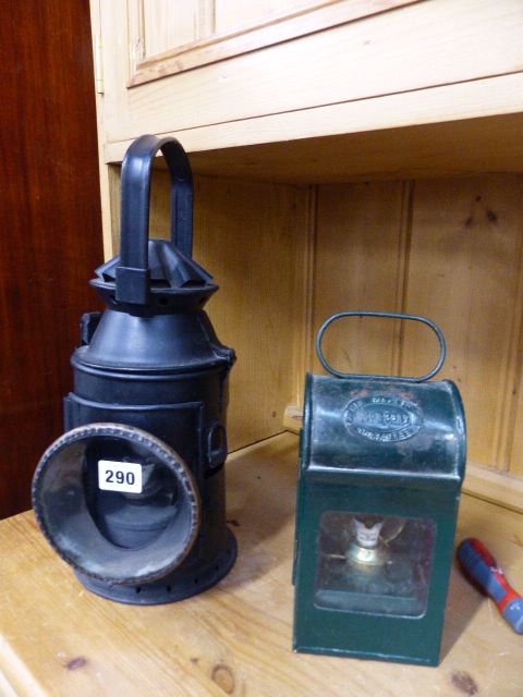 A RAILWAY LANTERN AND ONE OTHER.