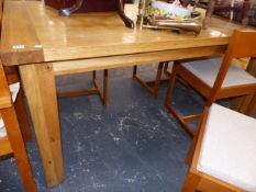 A LARGE OAK TABLE.