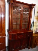 AN EARLY VICTORIAN MAHOGANY SECRETAIRE BOOKCASE.