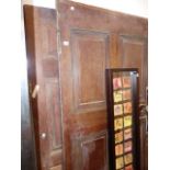 TWO LARGE MAHOGANY DOORS.