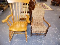 A ROCKING CHAIR AND AN ARMCHAIR.