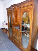 AN EDWARDIAN INLAID COMPACTUM WARDROBE.