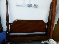 A MAHOGANY BED FRAME.