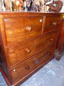 A VICTORIAN MAHOGANY AND CEDAR LINED CHEST OF TWO SHORT AND TWO LONG DEEP DRAWERS.