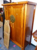 AN ORIENTAL HARDWOOD CABINET.