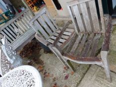 A TEAK PATIO SUITE.